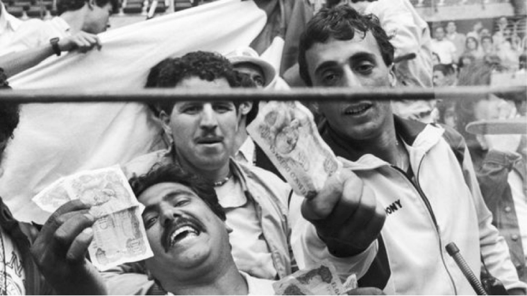 Algerian spectators attending the 1982 Germany-Austria match waved and burned peseta notes to demonstrate their suspicion of match rigging. Copyright: dpa