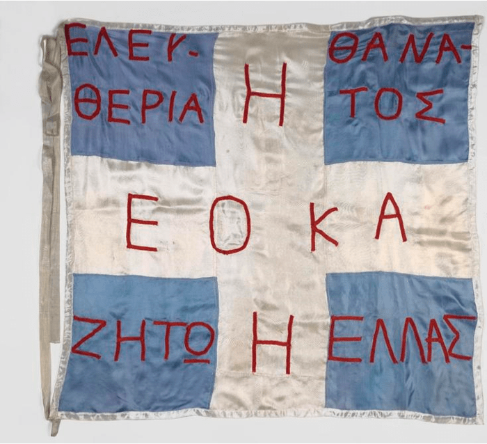 EOKA imagery routinely appropriated symbols of Greek nationalism, such as the cross on this flag. © Imperial War Museum (FLA 2280) 