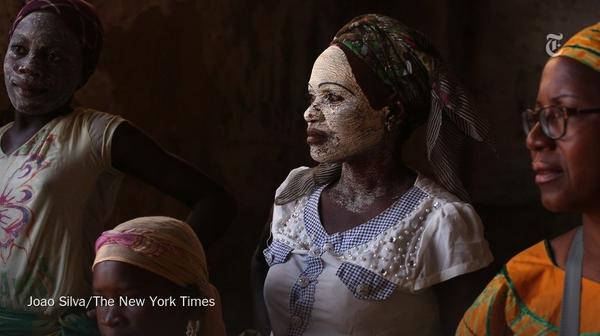 Mozambican women in a building that used to serve as slave housing. Photo: Joao Silva, New York Times.