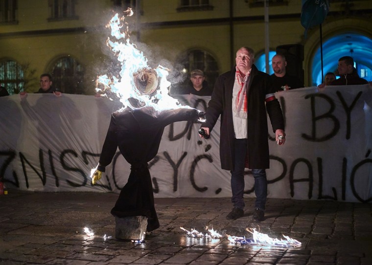 Supporters of the National-Radical Camp (ONR) and the All-Polish Youth demonstrate against refugees in Wroclaw, Poland, Nov. 18, 2015. Courtesy of Slate.