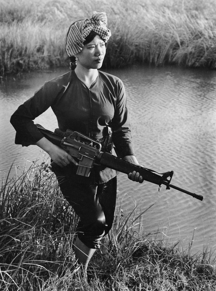 A Viet Cong guerrilla stands guard in the Mekong Delta.  IMAGE: LE MINH TRUONG/ANOTHER VIETNAM/NATIONAL GEOGRAPHIC BOOKS